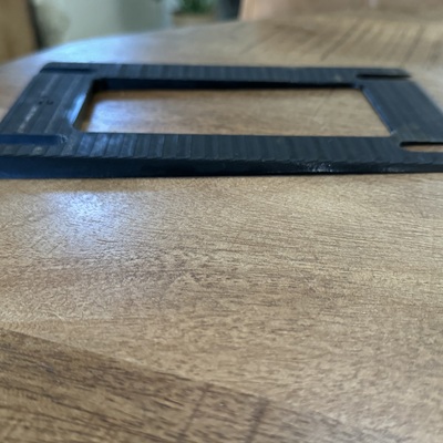 Mast rake shim plate