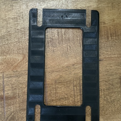 Mast rake shim plate